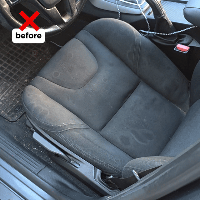 Autostoel aan bestuurderskant met zichtbare vlekken en vuil, gelabeld before-perfect voor het demonstreren van interieur reinigen of vlekken verwijderen auto.